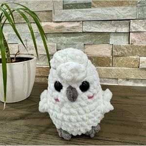 Handmade crocheted umbrella cockatoo